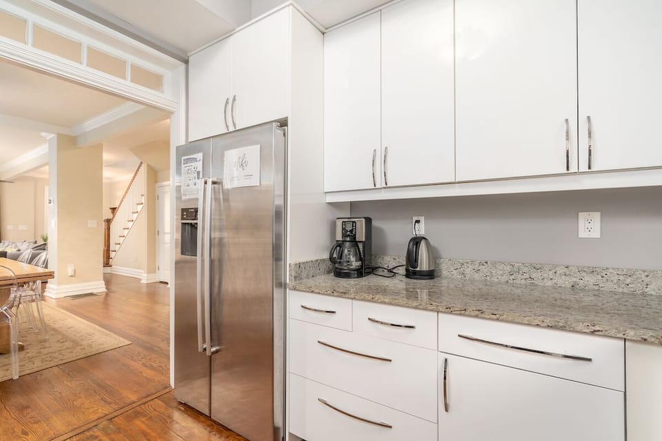 fridge/freezer, electric kettle, and coffee maker