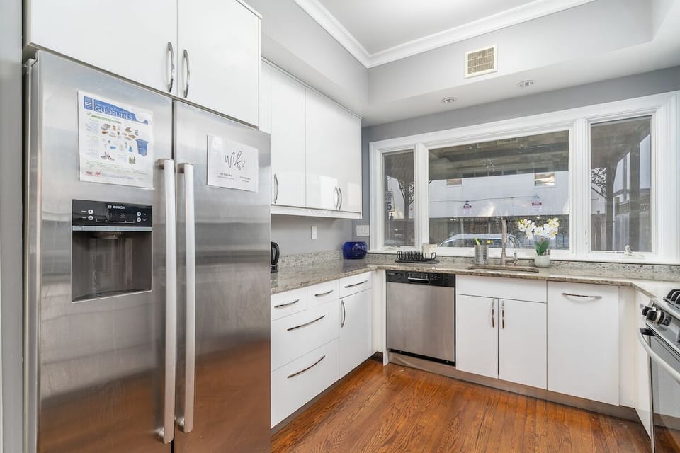 kitchen with fridge/freezer, dishwasher sink