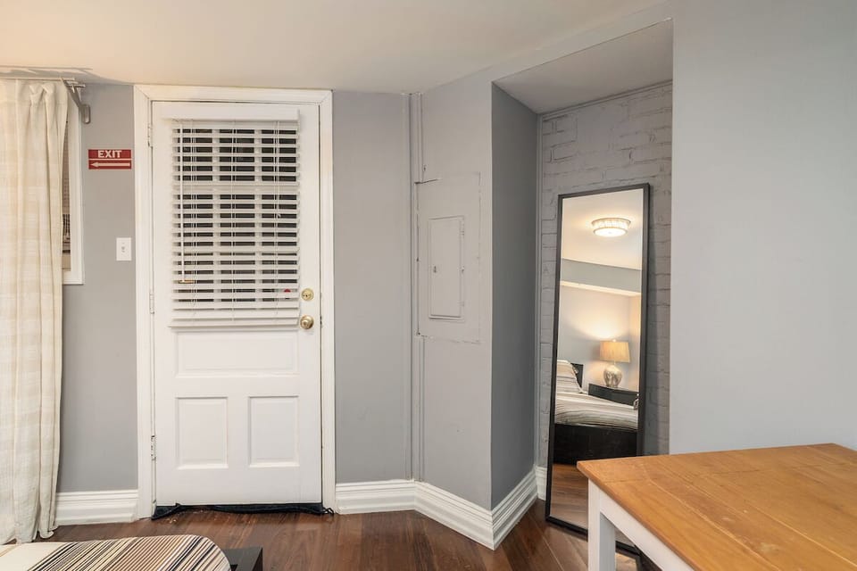 bedroom #2 with full length mirror and desk