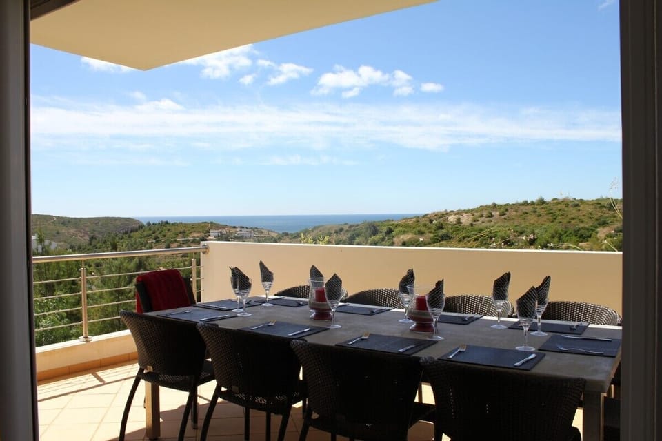 Large table with seating for 10 Outside great sea views and national park.