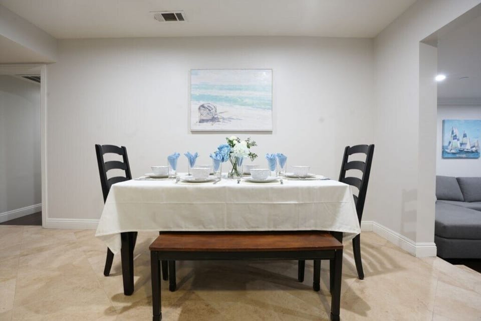 Dining Area with Additional Seating in Living Room and Peninsula