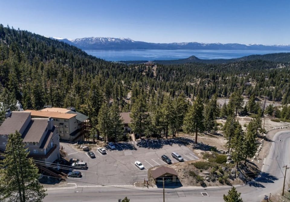 Aerial view of the parking lot and shuttle stop right outside the house!