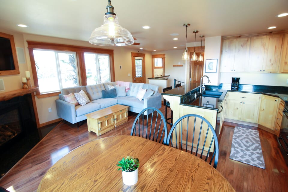 Open kitchen and living room with plenty of seating for your entire family.