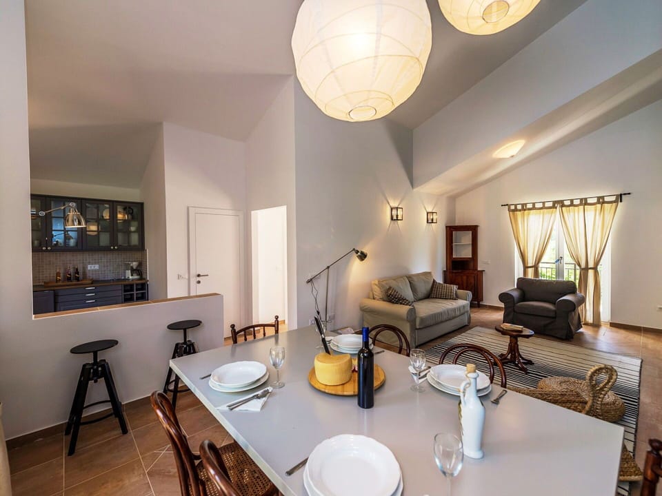 Furniture, Interior Design, Flooring, Wall, Floor, Ceiling, Room, Wood, Light Fixture, Lighting