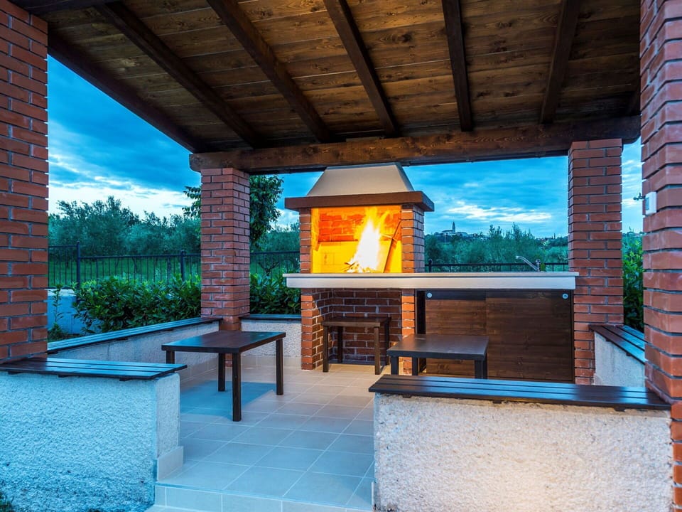 Furniture, Outdoor Furniture, Patio, Chair, Garden, Shade, Resort, Outdoor Structure, Swimming Pool, Outdoor Table