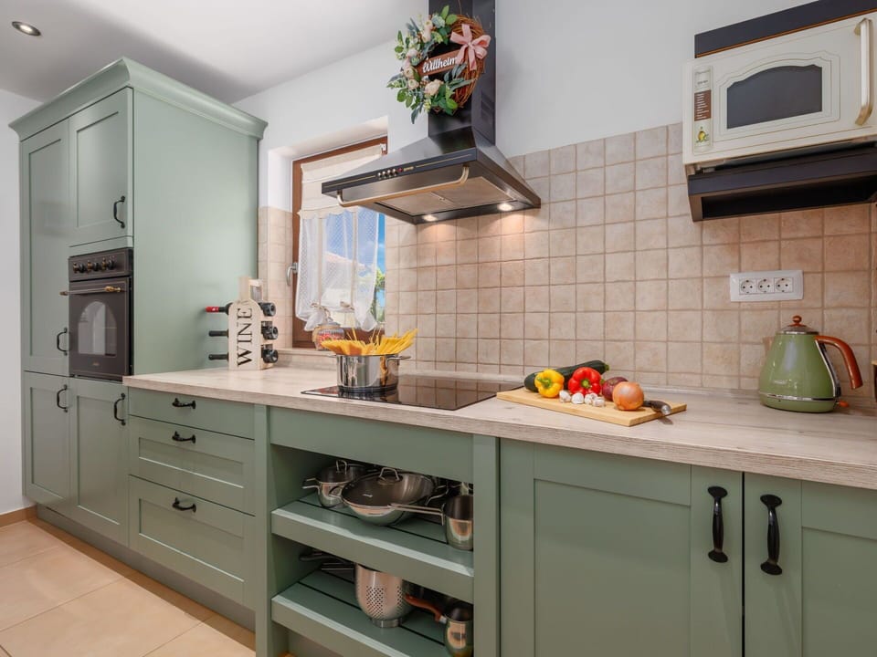 Kitchen, Cabinetry, Kitchen Appliance, Countertop, Interior Design, Furniture, Flooring, Drawer, Wood, Major Appliance