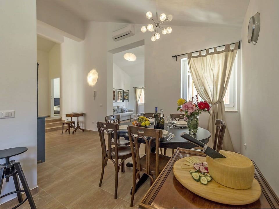 Interior Design, Furniture, Flooring, Ceiling, Floor, Wood, Light Fixture, Lighting, Room, Chair