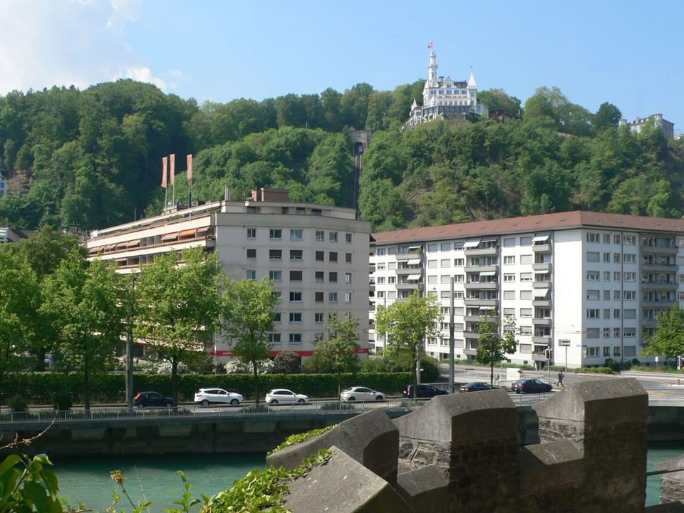 Building, Architecture, Town, City, Human Settlement, Metropolitan Area, Waterway, Urban Area, River, Tree
