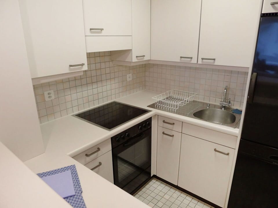 Property, Room, Countertop, Kitchen, Cabinetry, Tile, Furniture, Sink, Interior Design, Real Estate