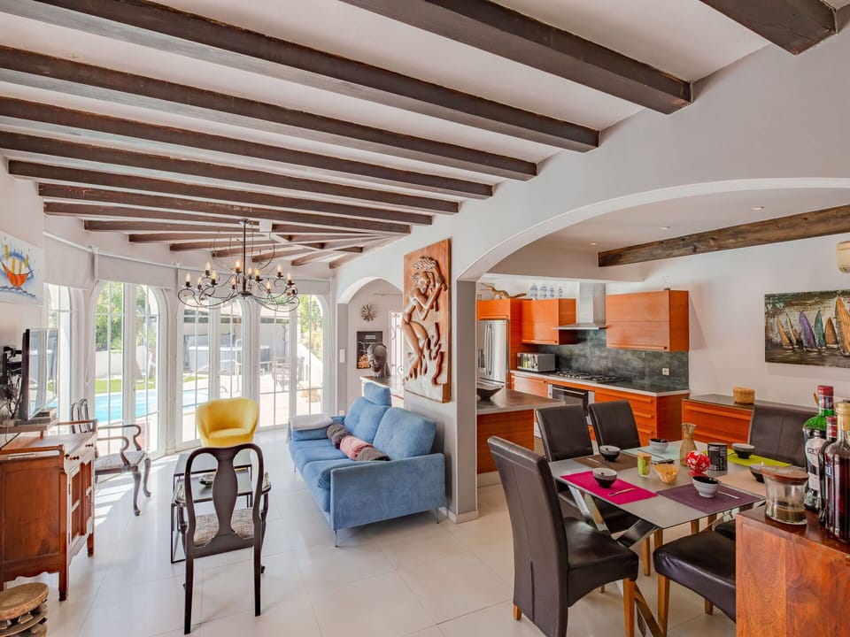 Furniture, Property, Table, Picture Frame, Chair, Couch, Interior Design, Orange, Desk, Building