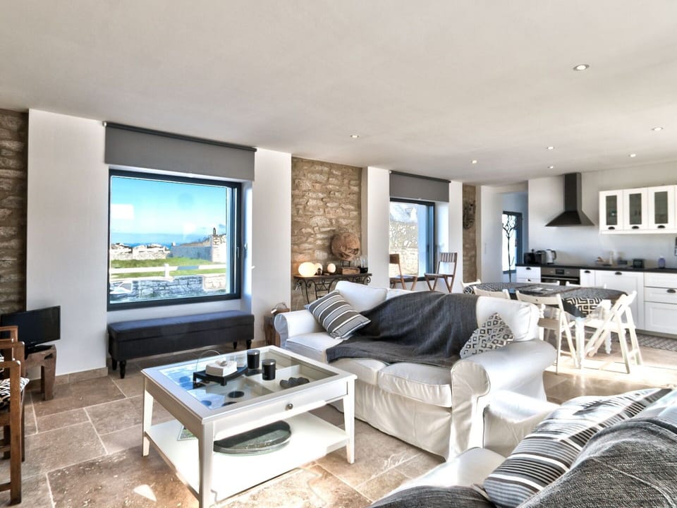 Living Room, Property, Room, Furniture, Interior Design, Coffee Table, Building, Home, Floor, Table