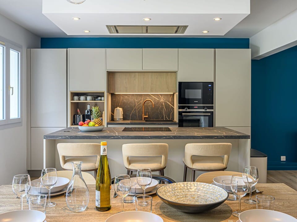 Furniture, Interior Design, Kitchen, Flooring, Countertop, Wall, Chair, Wood, Ceiling, Kitchen Appliance