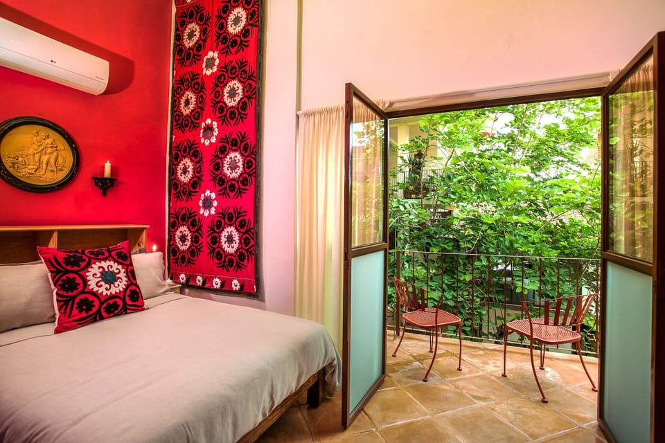 CANELO. Master Bedroom With Queen Bed, Air Conditioning & Private Balcony.
