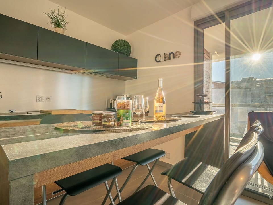 Furniture, Table, Wood, Kitchen, Lighting, Interior Design, Cabinetry, Countertop, Flooring, Building