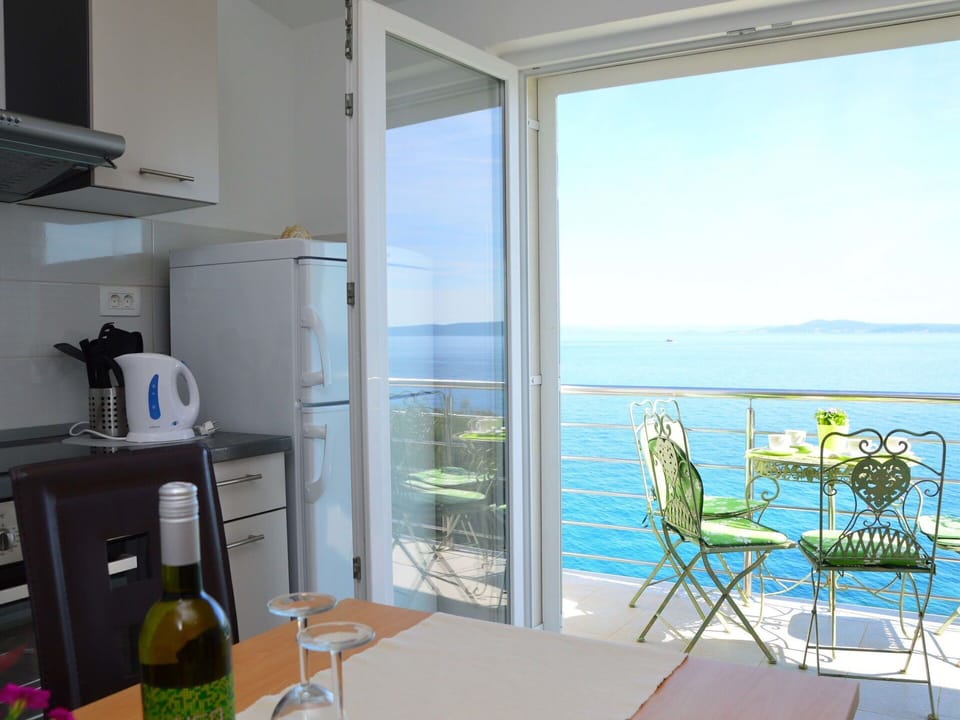 Property, Sky, Building, Furniture, Window, Shade, Kitchen Appliance, Interior Design, Bottle, Chair