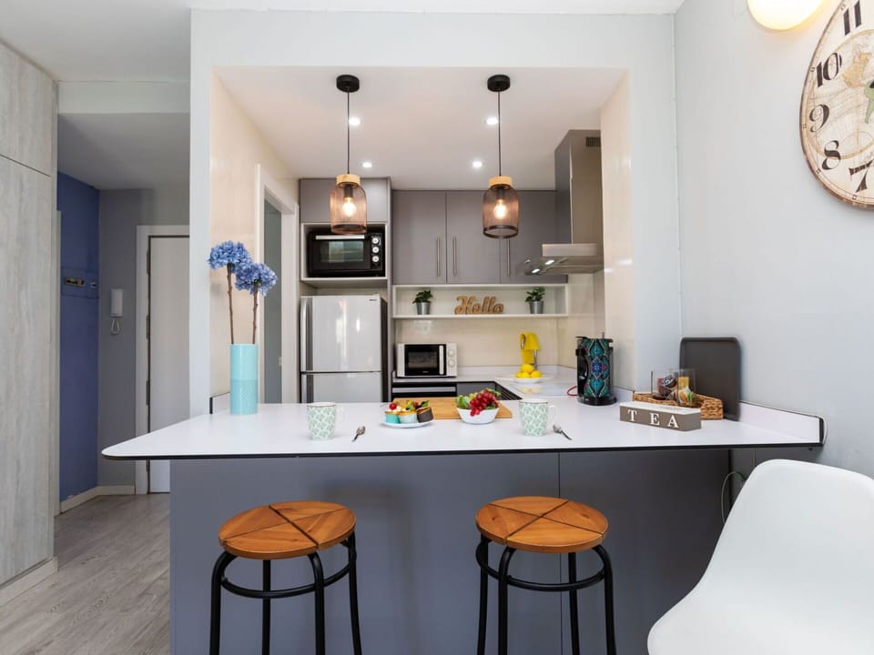 Table, Furniture, Property, Cabinetry, Countertop, Interior Design, Lighting, Orange, Flooring, Floor