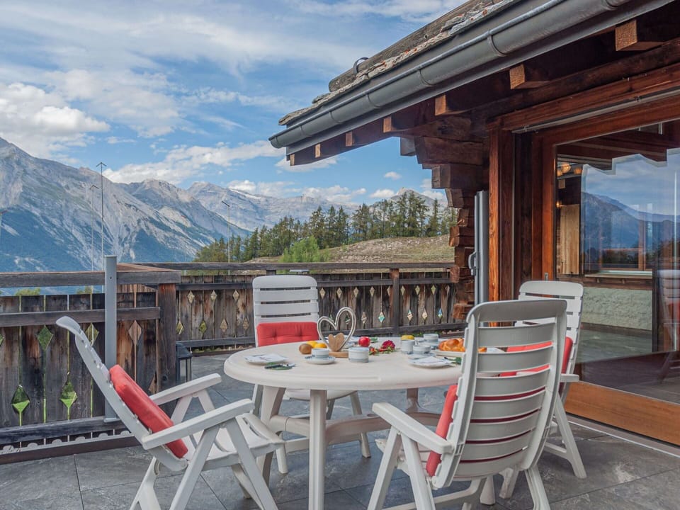 Sky, Cloud, Property, Furniture, Mountain, Table, Chair, Building, Wood, Outdoor Furniture