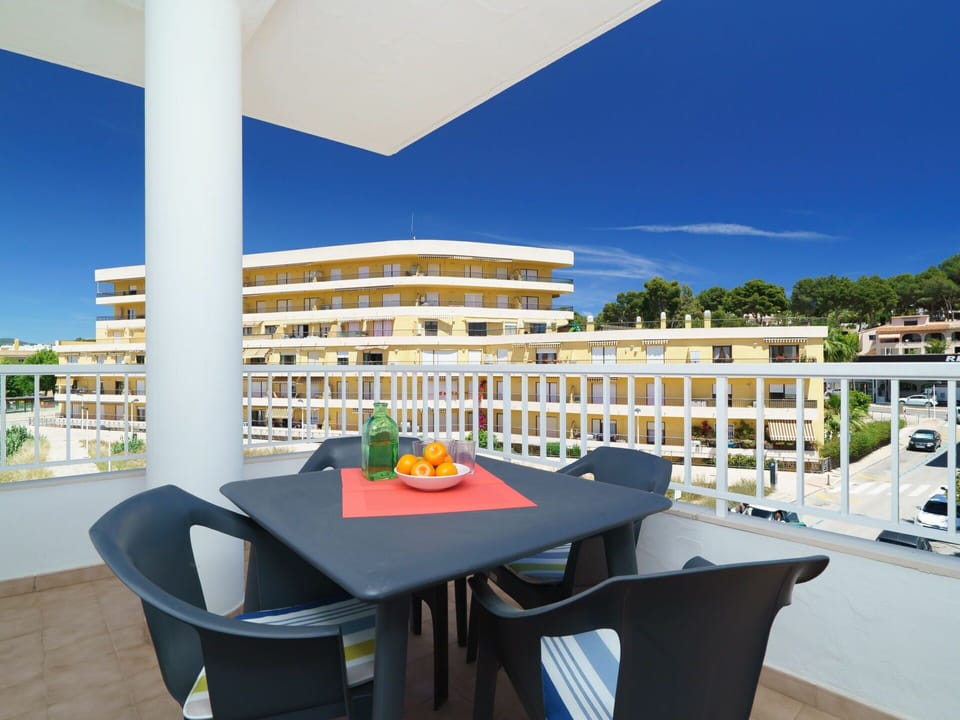 Sky, Table, Daytime, Building, Furniture, Property, Shade, Chair, Interior Design, Urban Design