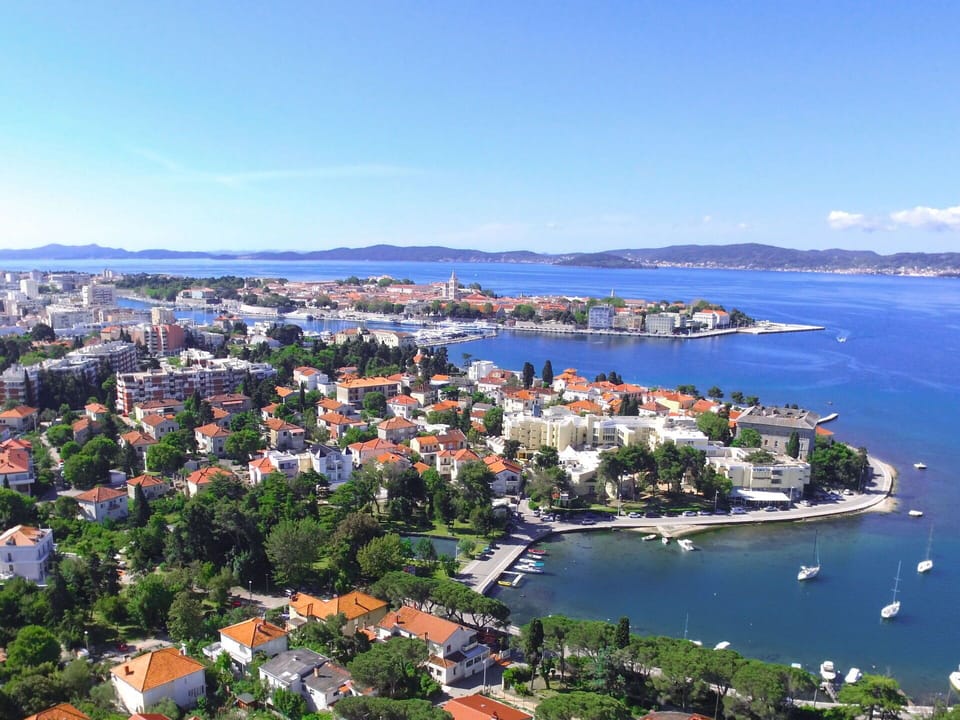 Water, Sky, Building, Azure, Nature, Blue, Tree, Coastal And Oceanic Landforms, Lake, Horizon