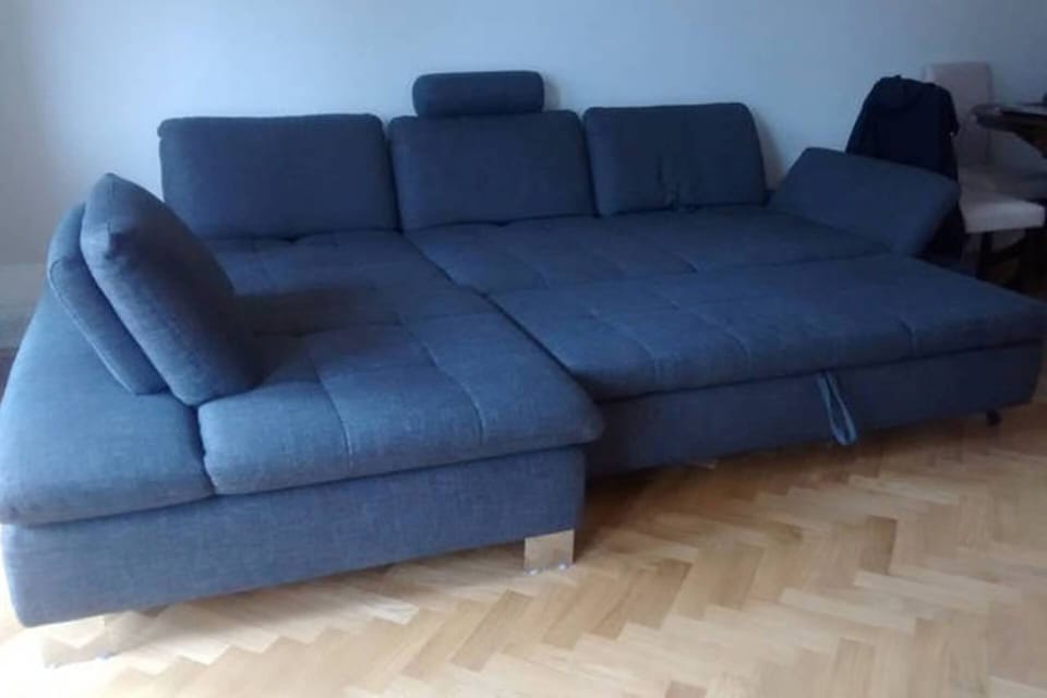 Sofa bed in the Living room fully opened up
