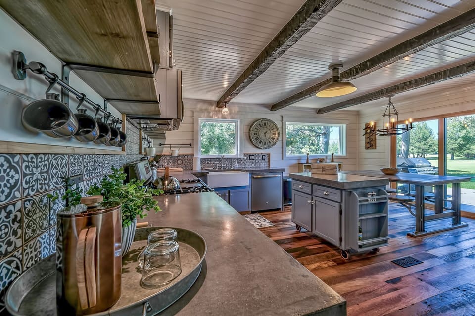 The farmhouse-style kitchen provides the ideal space for cooking and eating, fully stocked with the tools you need to prepare delicious meals for the family