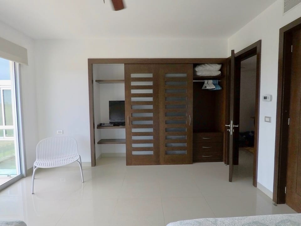 2nd bedroom w/TV and DVD.  Closet with extra pillows and blankets.