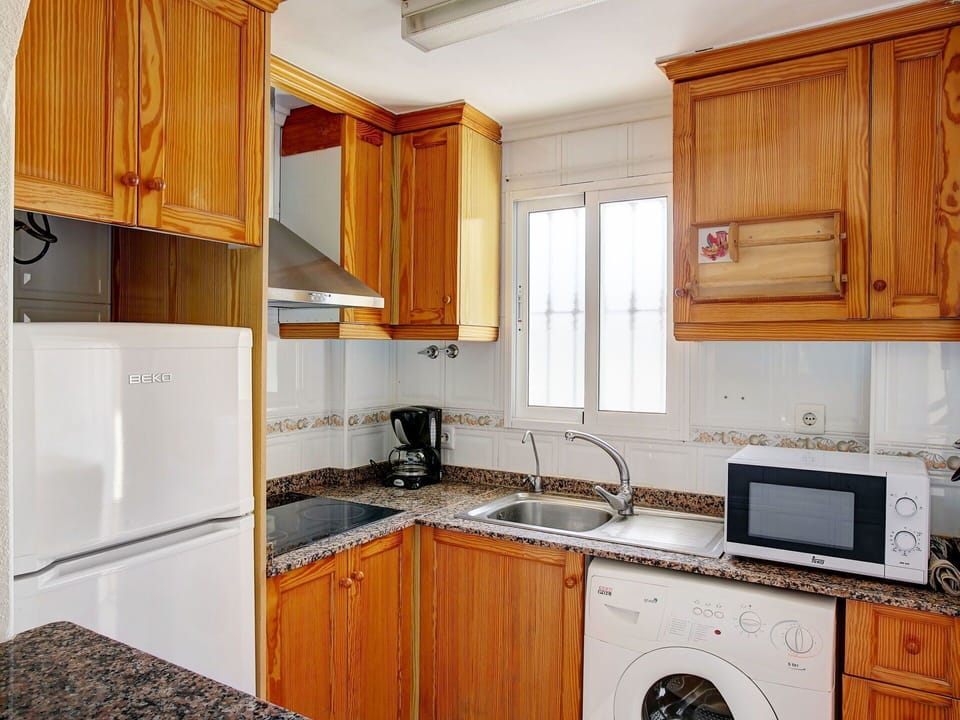 Countertop, Cabinetry, Room, Property, Kitchen, Furniture, Major Appliance, Building, House, Interior Design