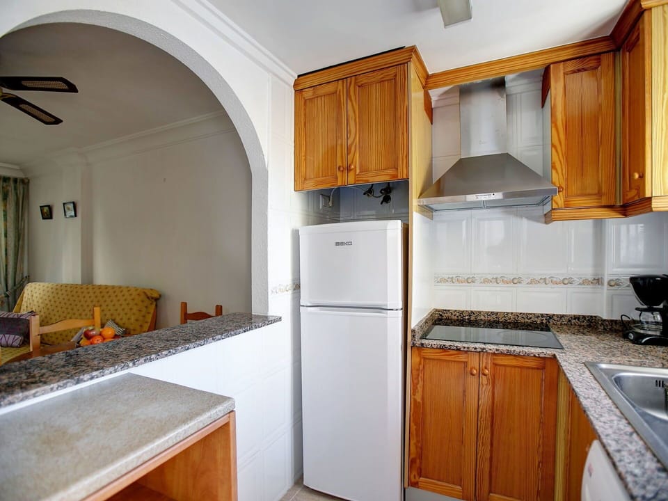 Countertop, Room, Property, Kitchen, Cabinetry, Furniture, Building, Refrigerator, House, Real Estate