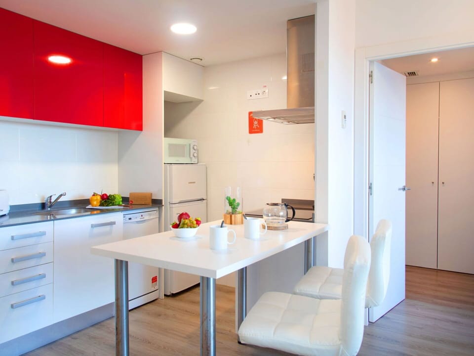 Property, Furniture, Table, Interior Design, Orange, Cabinetry, Flooring, Building, Countertop, Wood