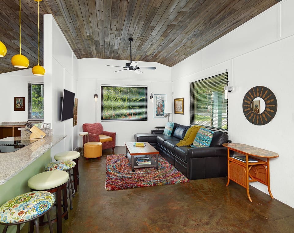 Large comfortable furnishings, cool concrete floors, unique décor, flat screen TV, and a queen size sleeper sofa.
