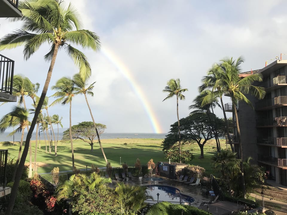 Morning rainbow over Maalaea Bay from our balcony