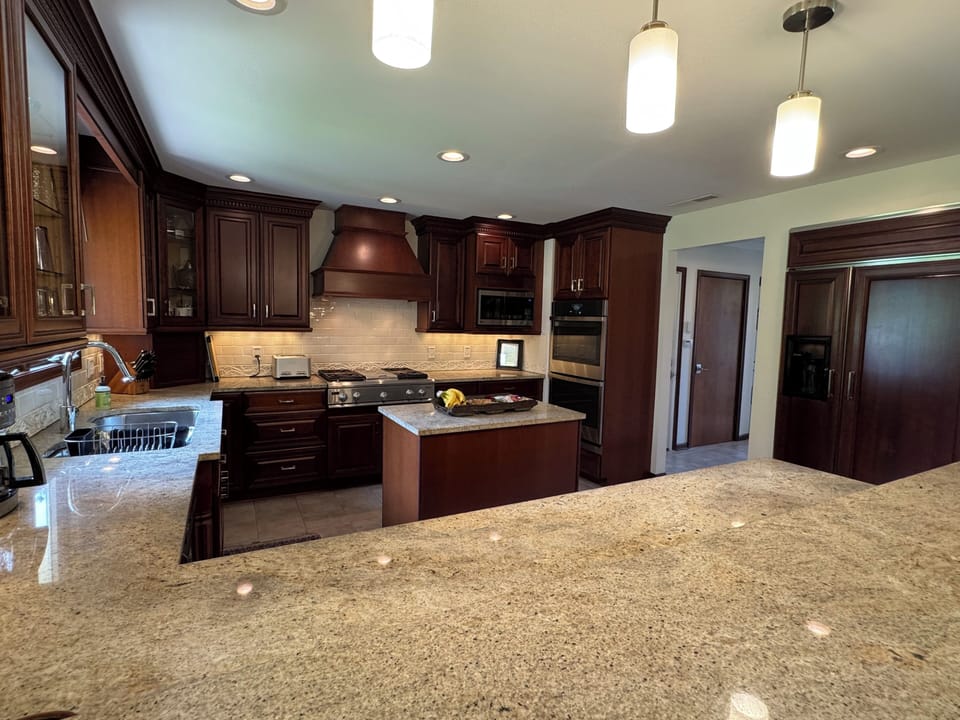A chef or host will enjoy cooking and serving from this well equipped kitchen