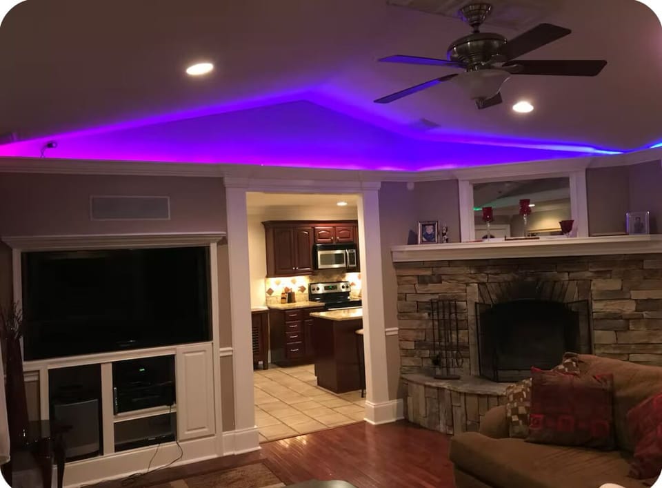 Living room, 60” Smart TV, with seating hearth.