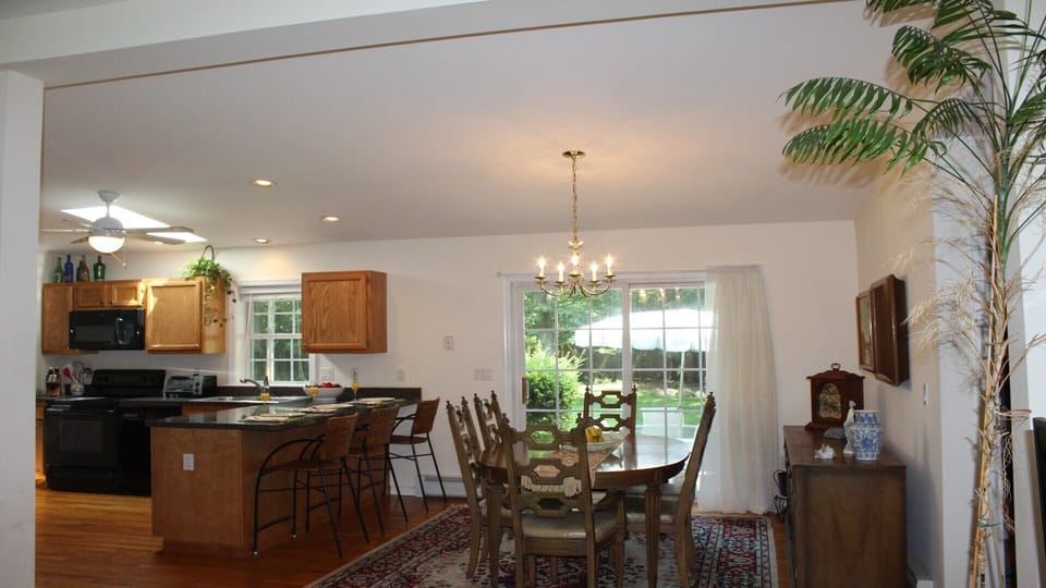 Dining room with sliders to the backyard. 