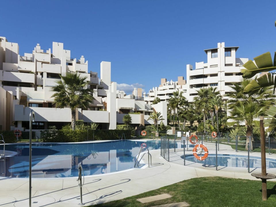 Sky, Building, Plant, Azure, Swimming Pool, Shade, Urban Design, Condominium, Tree, Neighbourhood
