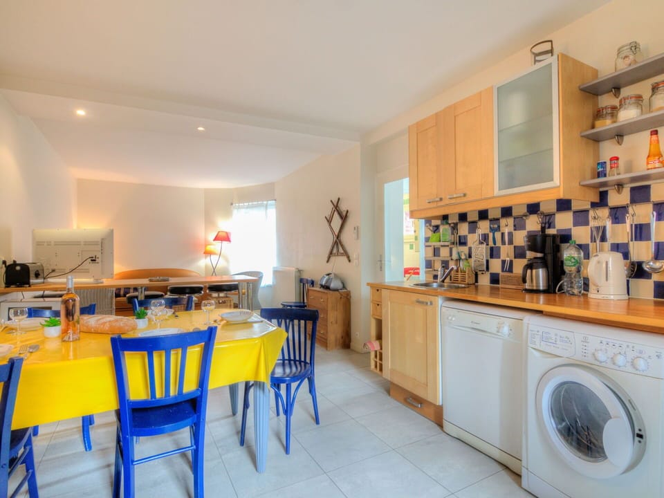 Furniture, Cabinetry, Laundry Room, Table, Building, Countertop, Chair, Kitchen, Home Appliance, House