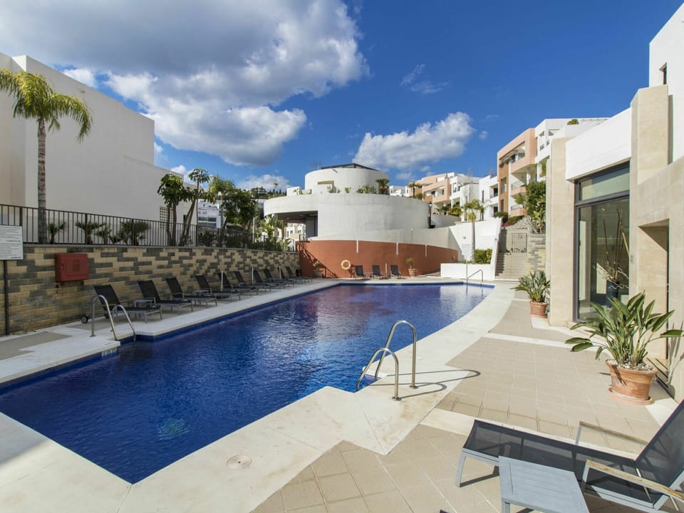 Water, Cloud, Sky, Plant, Swimming Pool, Azure, Building, Tree, Outdoor Furniture, Seaside Resort