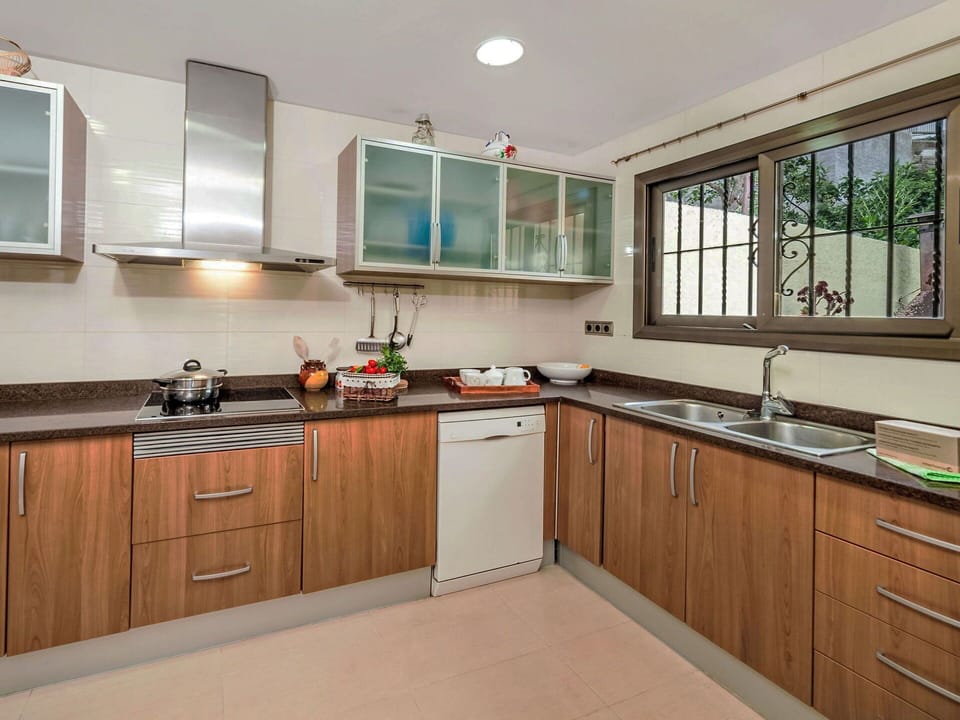 Kitchen, Kitchen Appliance, Countertop, Cabinetry, Major Appliance, Furniture, Wood, Interior Design, Home Appliance, Plumbing Fixture