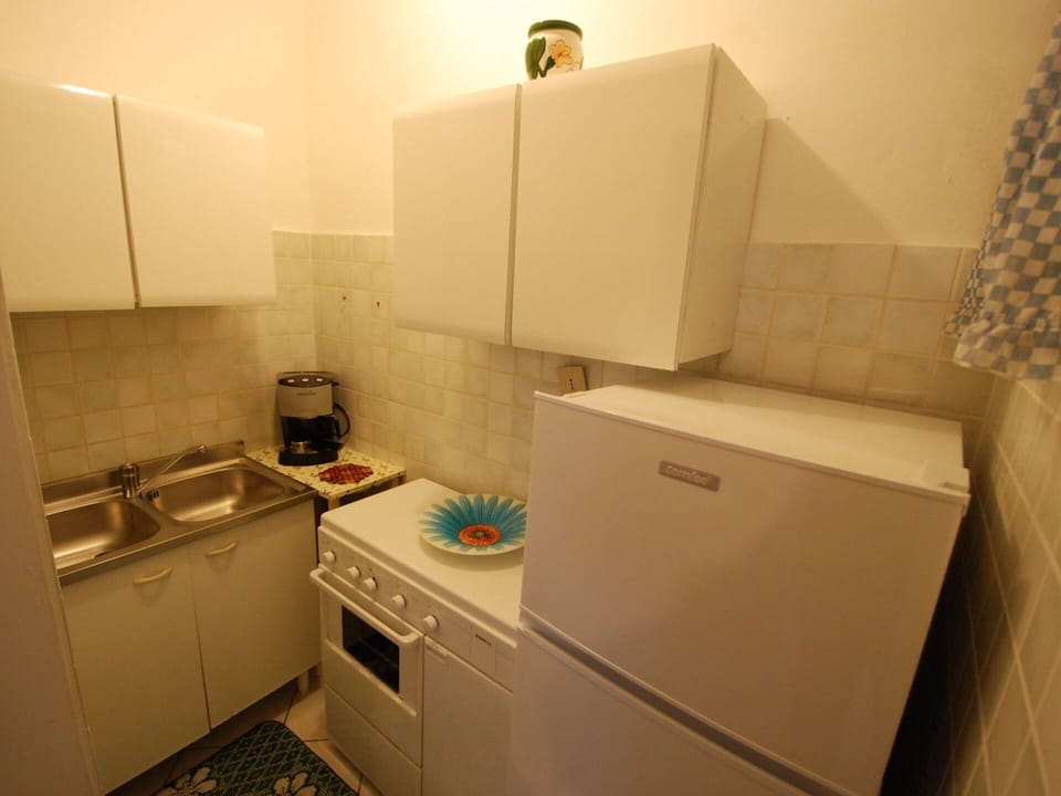 Room, Property, Furniture, Cabinetry, Floor, Interior Design, Major Appliance, Sink, Countertop, Kitchen