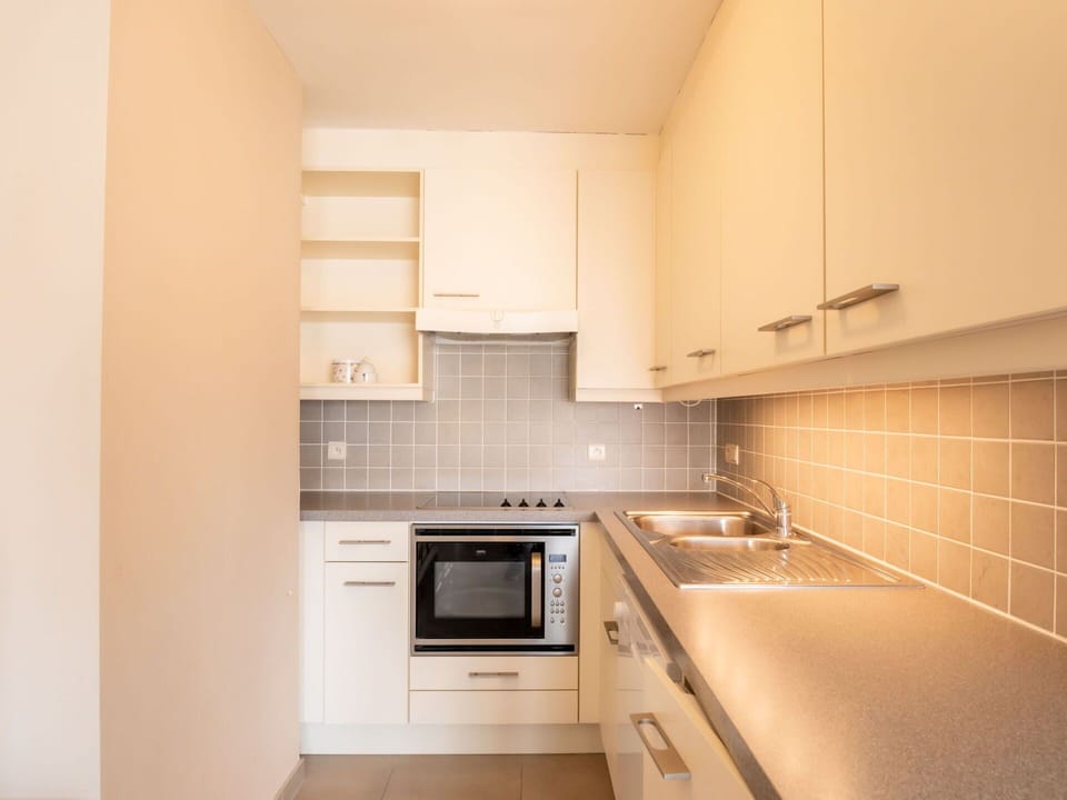Brown, Cabinetry, Countertop, Building, Sink, Furniture, Tap, Kitchen Stove, Kitchen, Wood