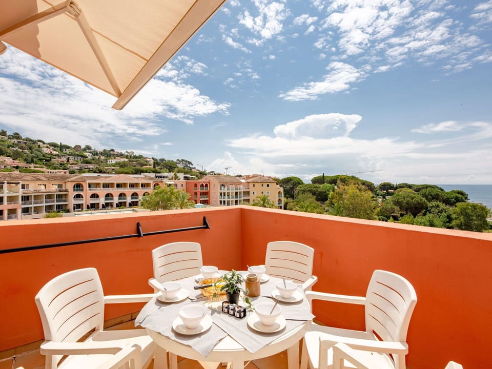 Sky, Cloud, Furniture, Property, Building, Table, Chair, Interior Design, Outdoor Furniture, Seaside Resort