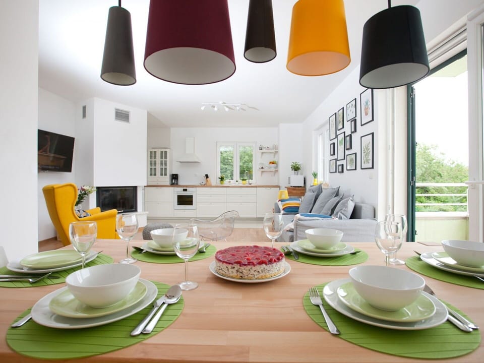 Dining Room, Room, Green, Interior Design, Lampshade, Lighting Accessory, Furniture, Yellow, Orange, Table