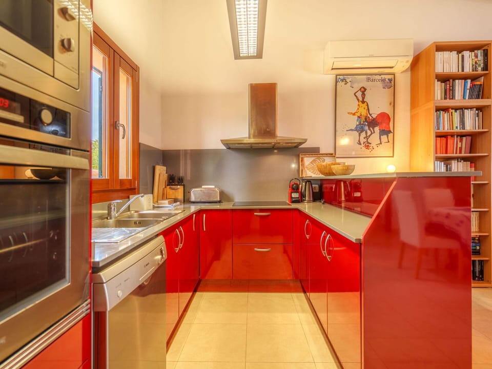 Property, Cabinetry, Bookcase, Countertop, Orange, Kitchen, Wood, Interior Design, Shelf, Floor