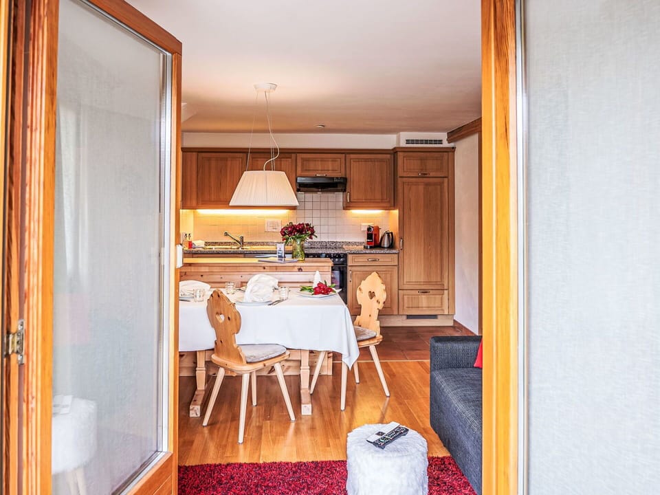 Furniture, Window, Table, Comfort, Bed Frame, Interior Design, Orange, Chair, Wood, Building