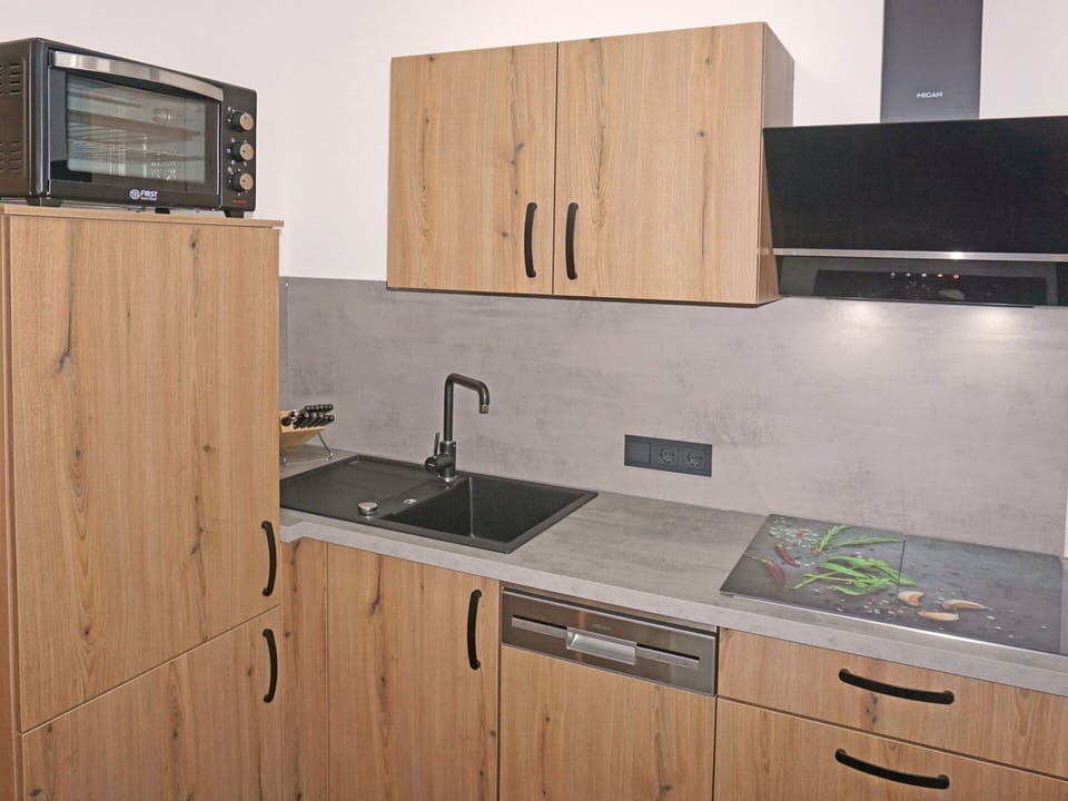 Countertop, Cabinetry, Kitchen Sink, Property, Sink, Tap, Plumbing Fixture, Kitchen, Wood, Interior Design