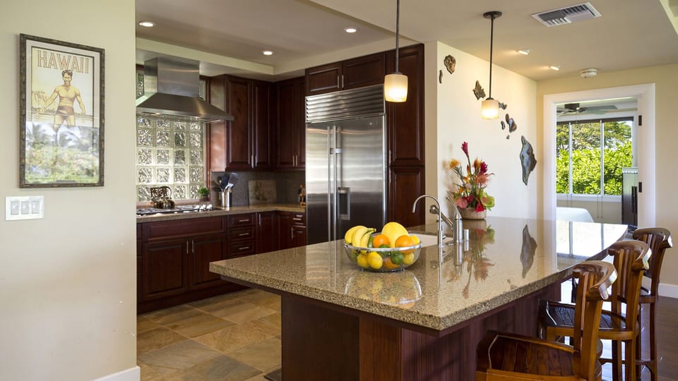 Gourmet Kitchen with Bar Area & Granite Countertops