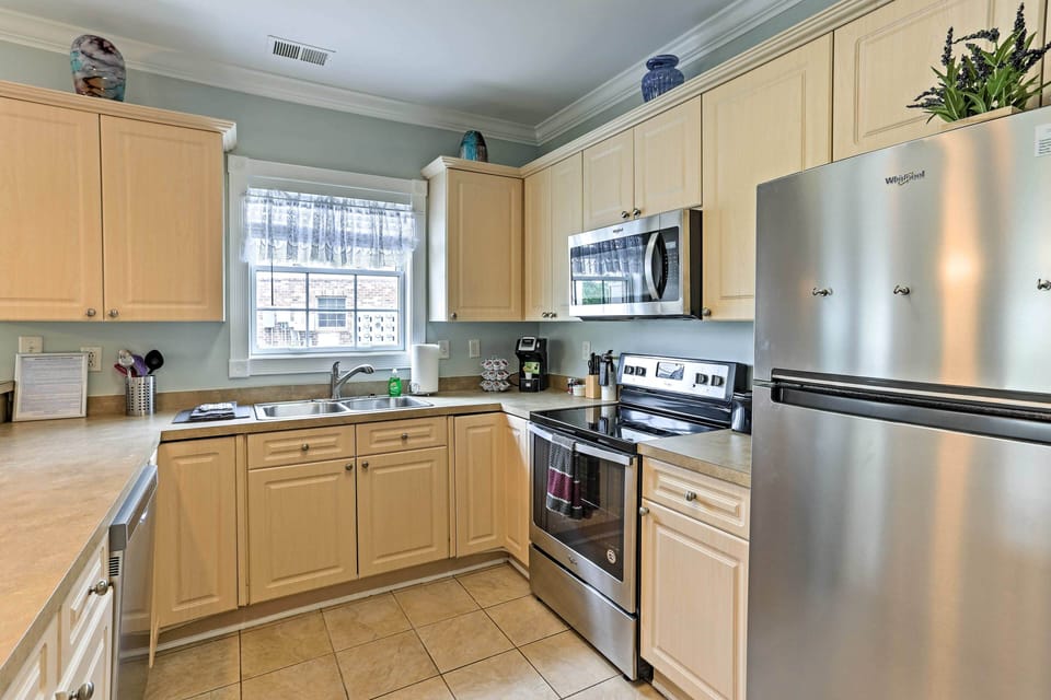 There are stainless steel appliances and plenty of counter space.