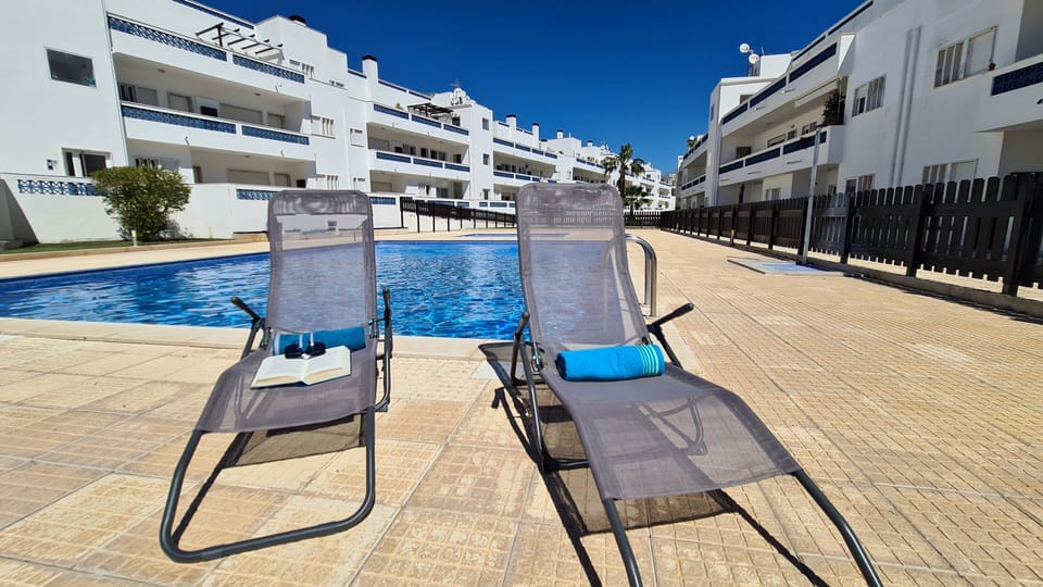 Pool area with chairs