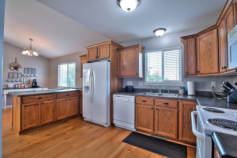 Prepare a snack for a feast in this large, inviting kitchen