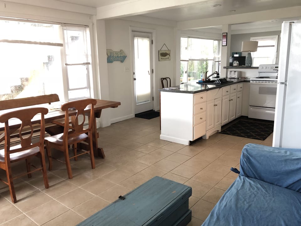 Unit D with fantastic views of beautiful “Grand Beach”.